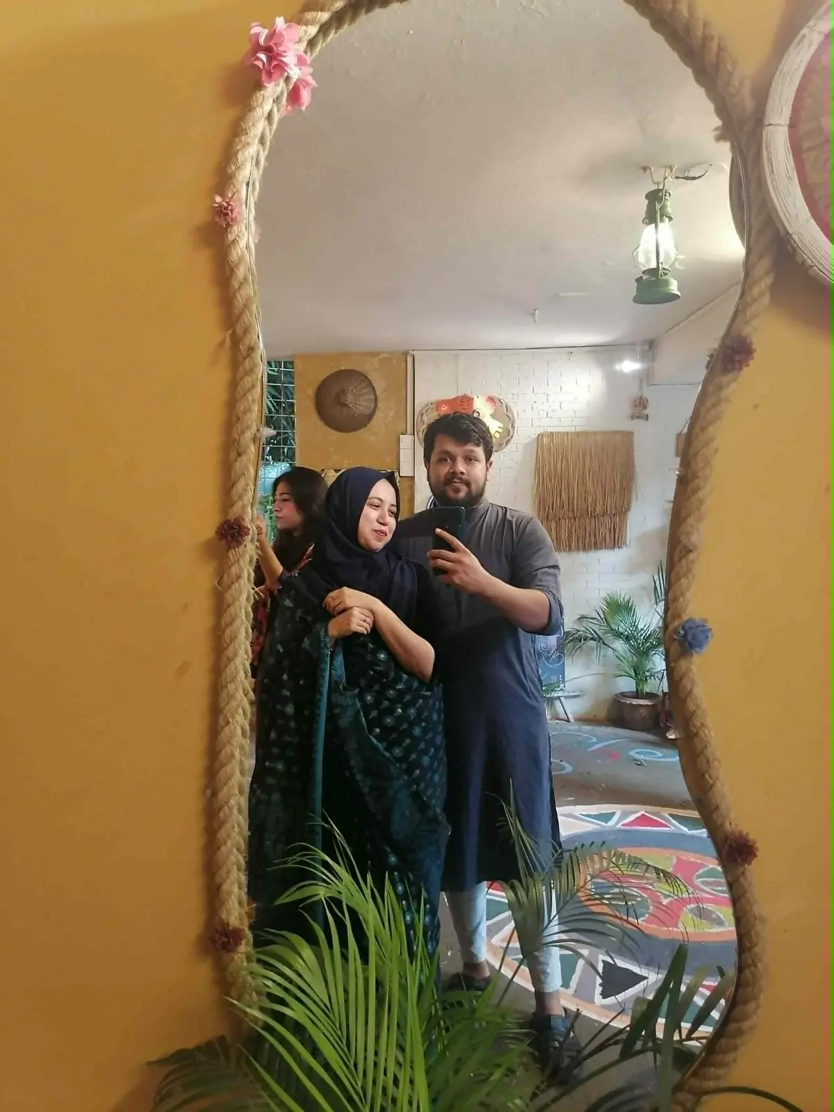 Misbah and Tajrian together in a mirror